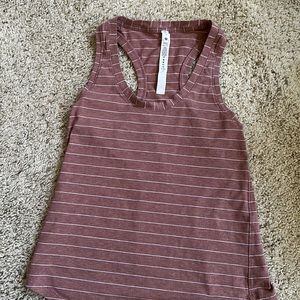 Very cute Lululemon tank top size 2 perfect for the gym